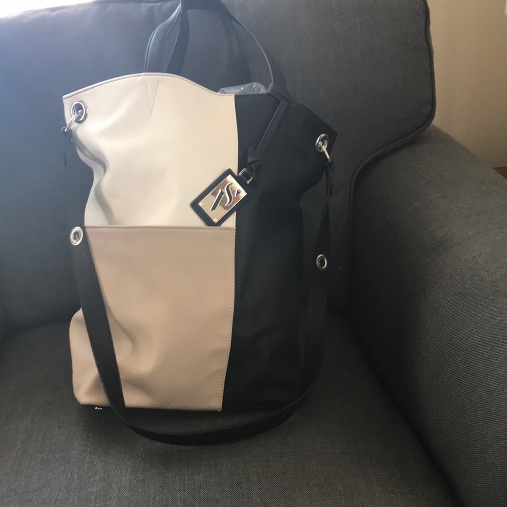 CLEARANCE! Donating Saturday! Vera Wang bucket bag